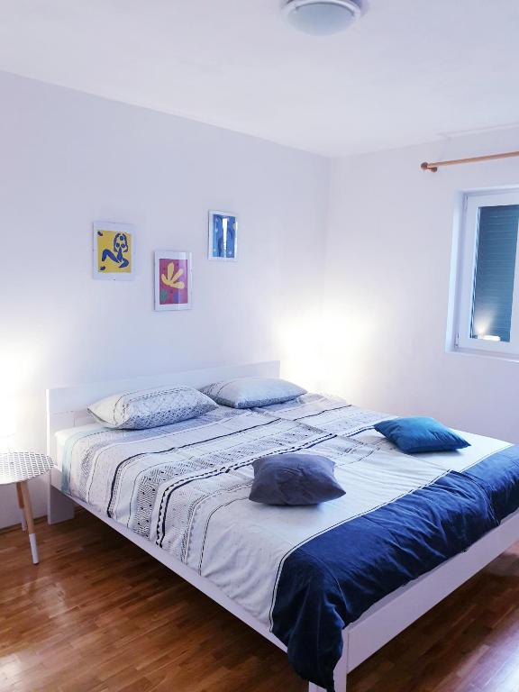 Krevet ili kreveti u jedinici u objektu Sali Modern Seaview Apartment