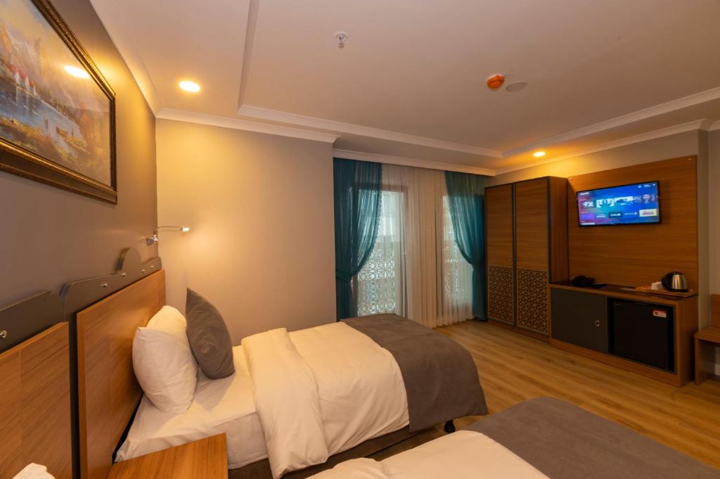 تصویر اتاق‌های New Emin Hotel - تصویر ۲