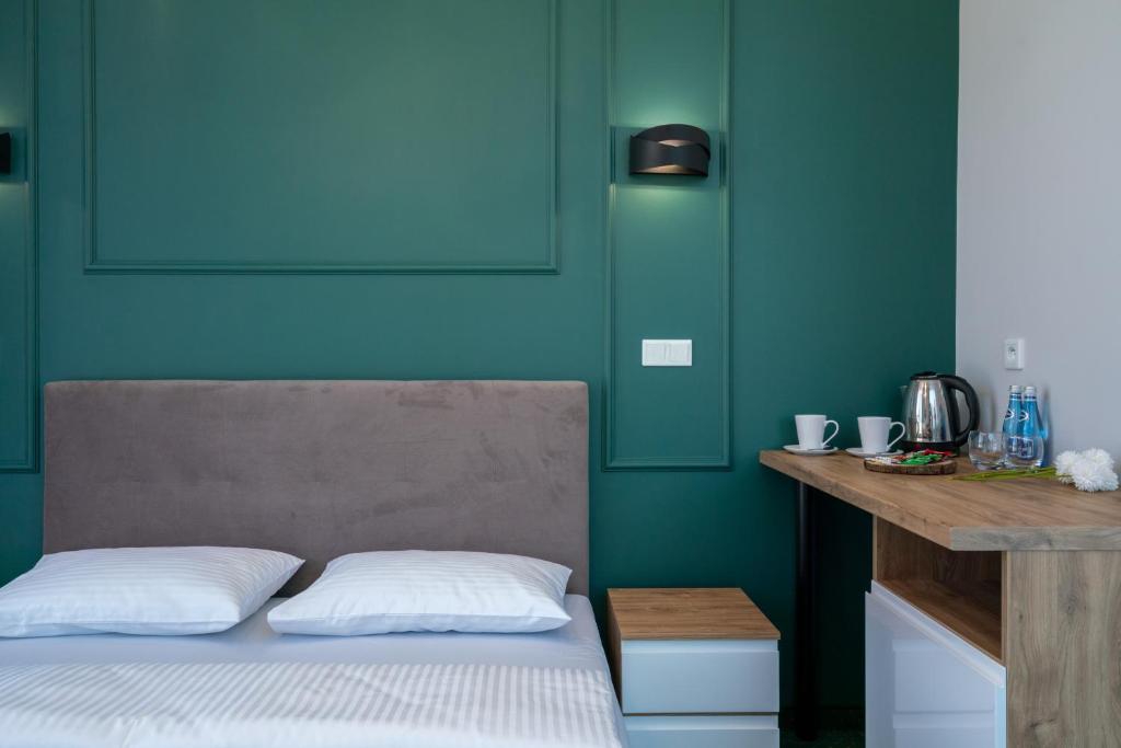 Posteľ alebo postele v izbe v ubytovaní Aquila Hotel