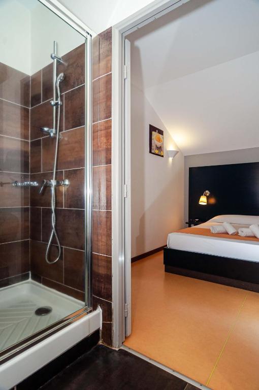 Koupelna v ubytování Tama Hotel
