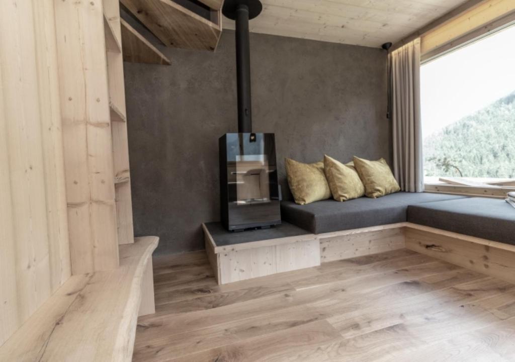 Posezení v ubytování Chalet Tschogerhof Tiers am Rosengarten Dolomiten