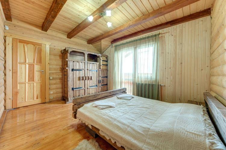 Postel nebo postele na pokoji v ubytování Mini Hotel Laplandiya