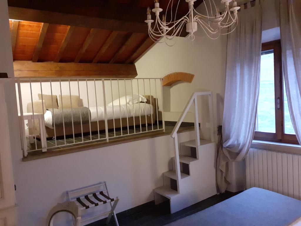 Postel nebo postele na pokoji v ubytování Hotel Le Macine