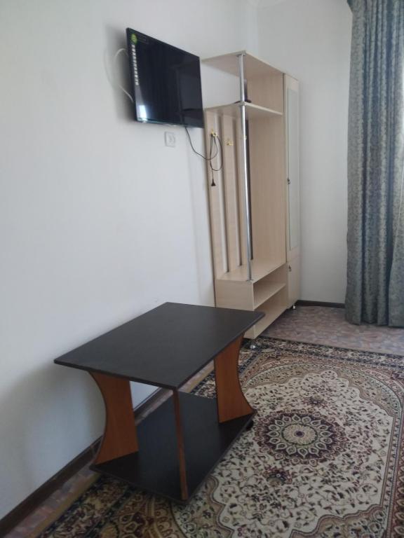 TV a/nebo společenská místnost v ubytování Guest House Arbat