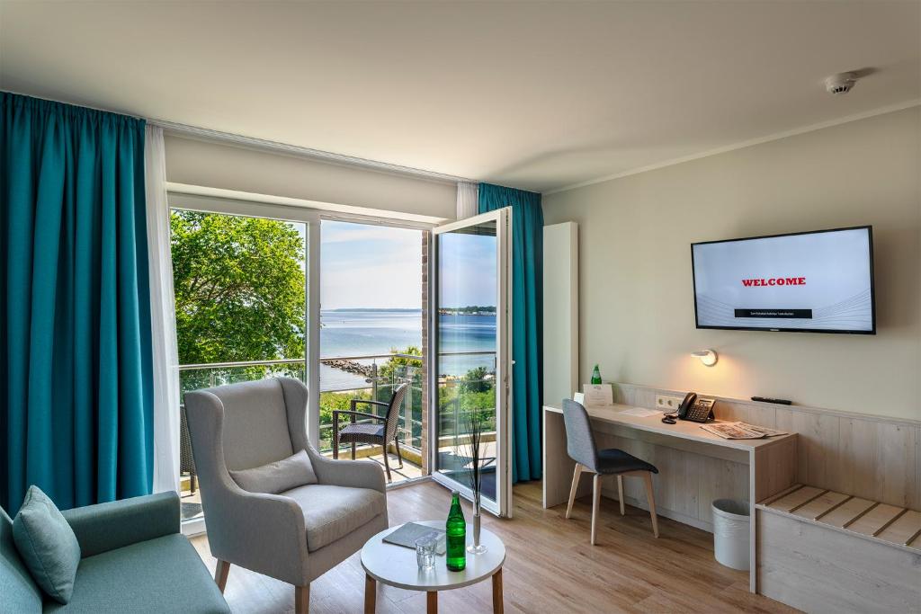 TV a/nebo společenská místnost v ubytování BeachSide