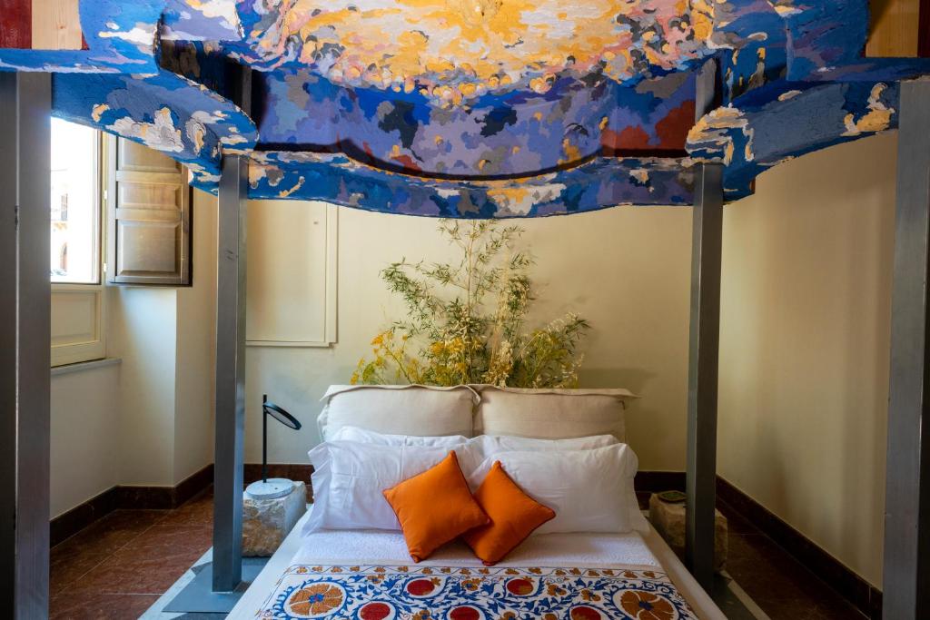 A bed or beds in a room at Casa Panitteri