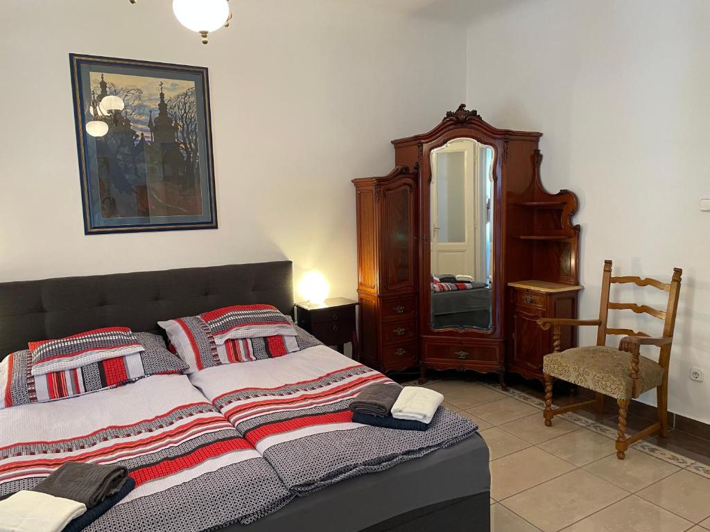 Posteľ alebo postele v izbe v ubytovaní Buda Castle Apartment
