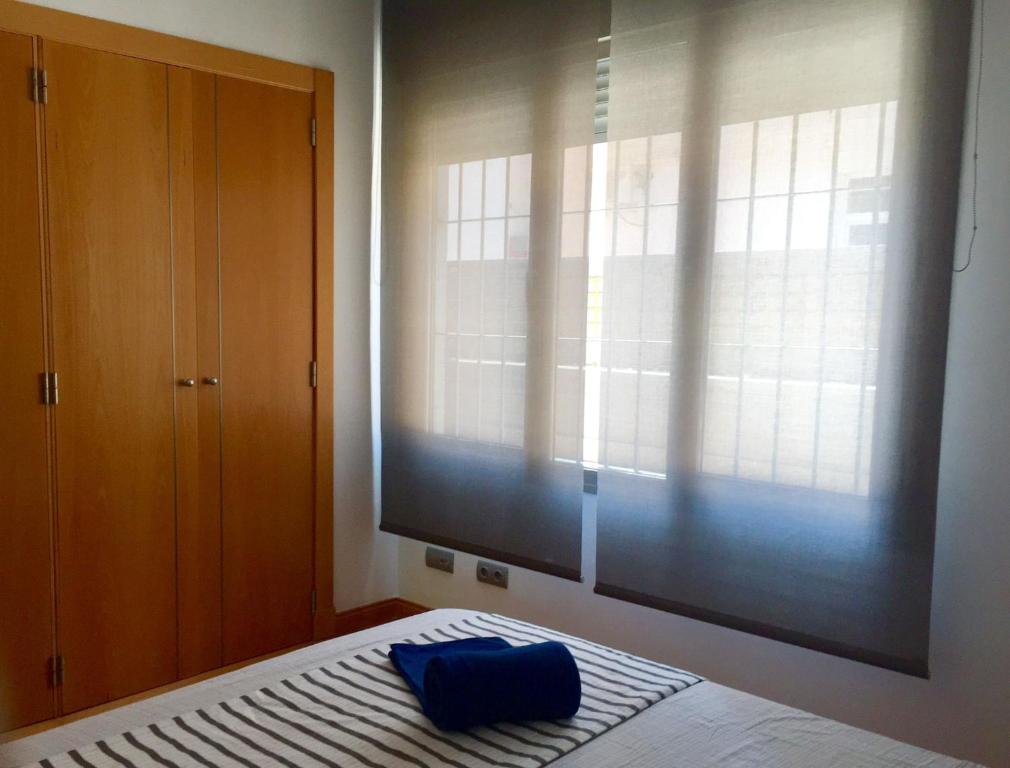 Posteľ alebo postele v izbe v ubytovaní Daria Beach Gran Terraza by AlohaMalaga