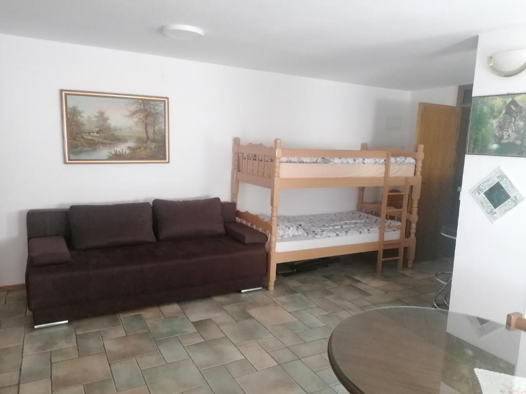 Postel nebo postele na pokoji v ubytování Apartma Gače