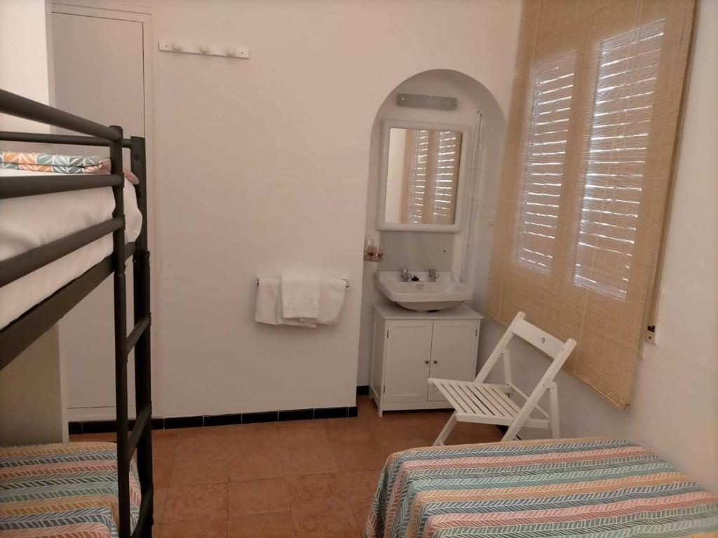 Postel nebo postele na pokoji v ubytování Fonda Can Dalfo by Vivere Stays