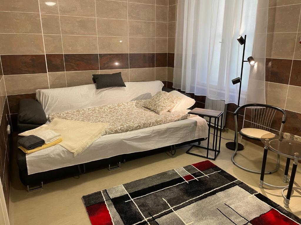 Posteľ alebo postele v izbe v ubytovaní Buda Castle Apartment