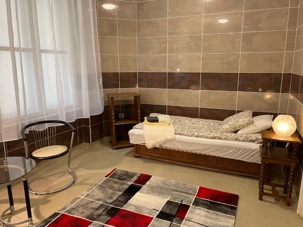 Posteľ alebo postele v izbe v ubytovaní Buda Castle Apartment