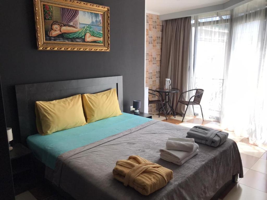 Postel nebo postele na pokoji v ubytování Batumi West Hotel