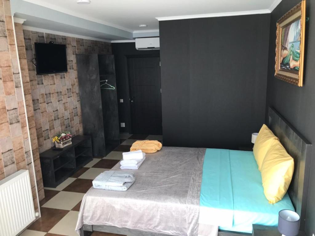 Postel nebo postele na pokoji v ubytování Batumi West Hotel