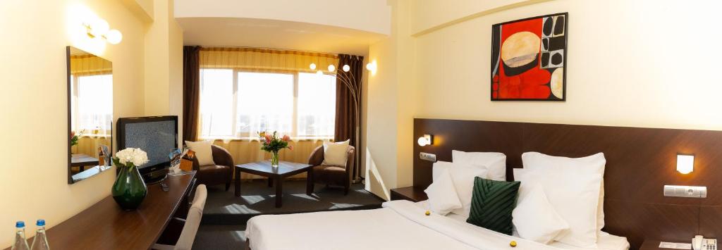 Postel nebo postele na pokoji v ubytování Hotel Terra Balneo