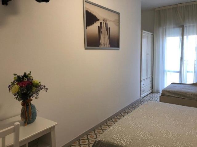 Postel nebo postele na pokoji v ubytování Hotel Calypso