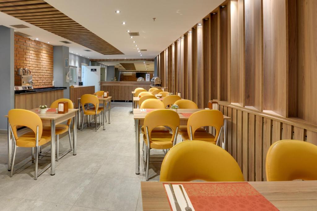 A seating area at Grande Stella Hotel