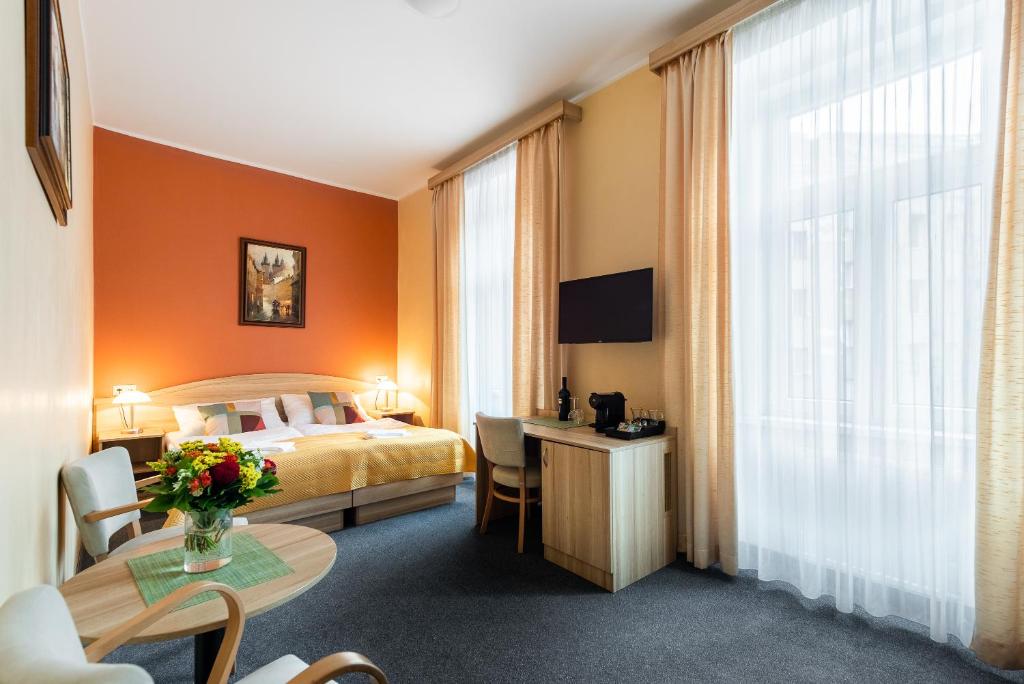 Postel nebo postele na pokoji v ubytování Hotel Libero