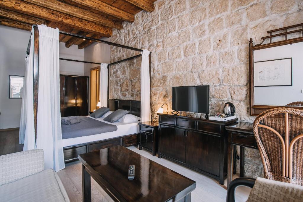 Telewizja i/lub zestaw kina domowego w obiekcie Villa Allure of Dubrovnik