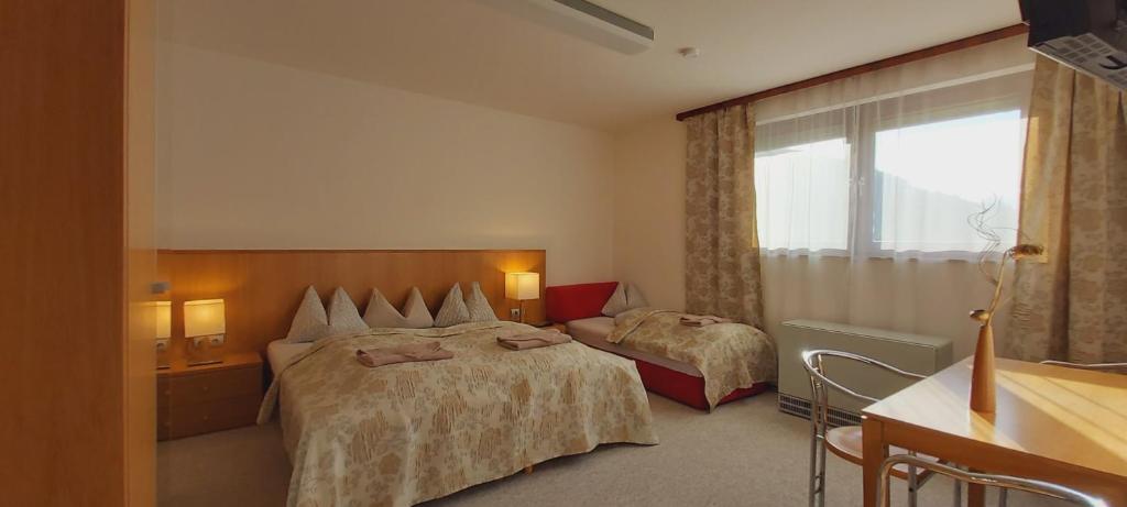 Postel nebo postele na pokoji v ubytování Ski Vital Apartments