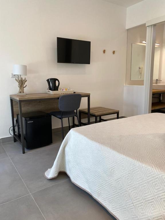 TV a/nebo společenská místnost v ubytování B&B direttamente sul mare da Antonino