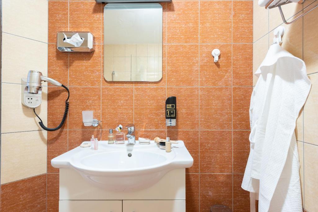 Koupelna v ubytování Hotel Libero