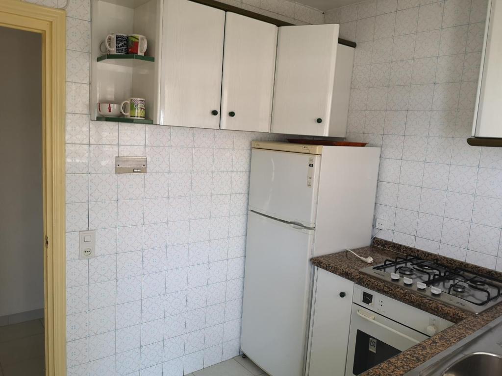 Kuchyň nebo kuchyňský kout v ubytování Apartamento Padoa playa