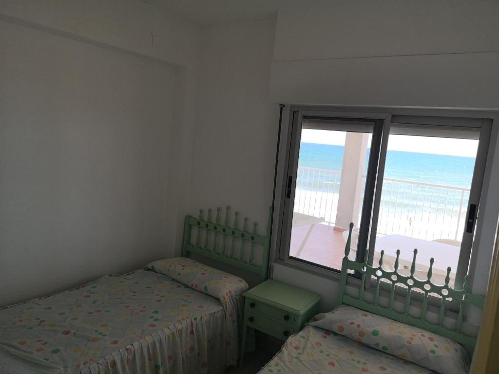 Postel nebo postele na pokoji v ubytování Apartamento Padoa playa