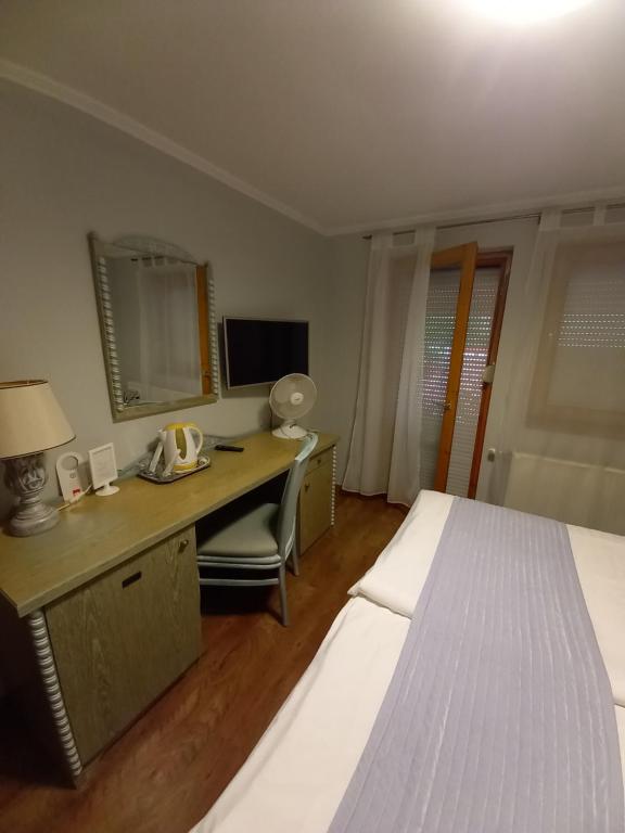 Postel nebo postele na pokoji v ubytování Mézesvölgy Vendégház