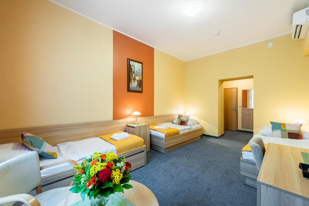 Postel nebo postele na pokoji v ubytování Hotel Libero
