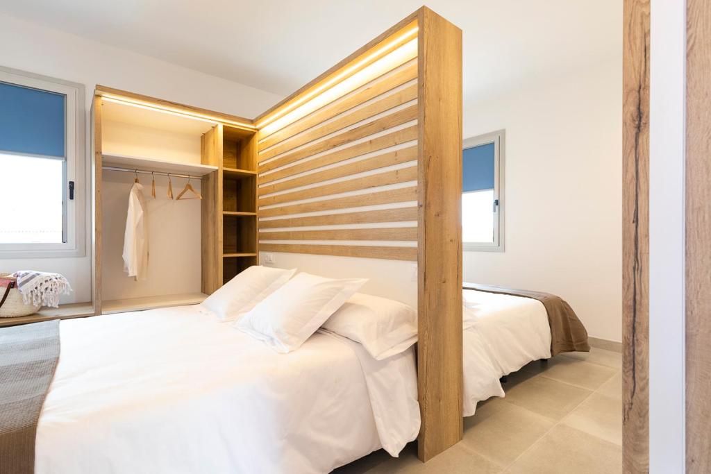Postel nebo postele na pokoji v ubytování Albana Apartaments Turístics