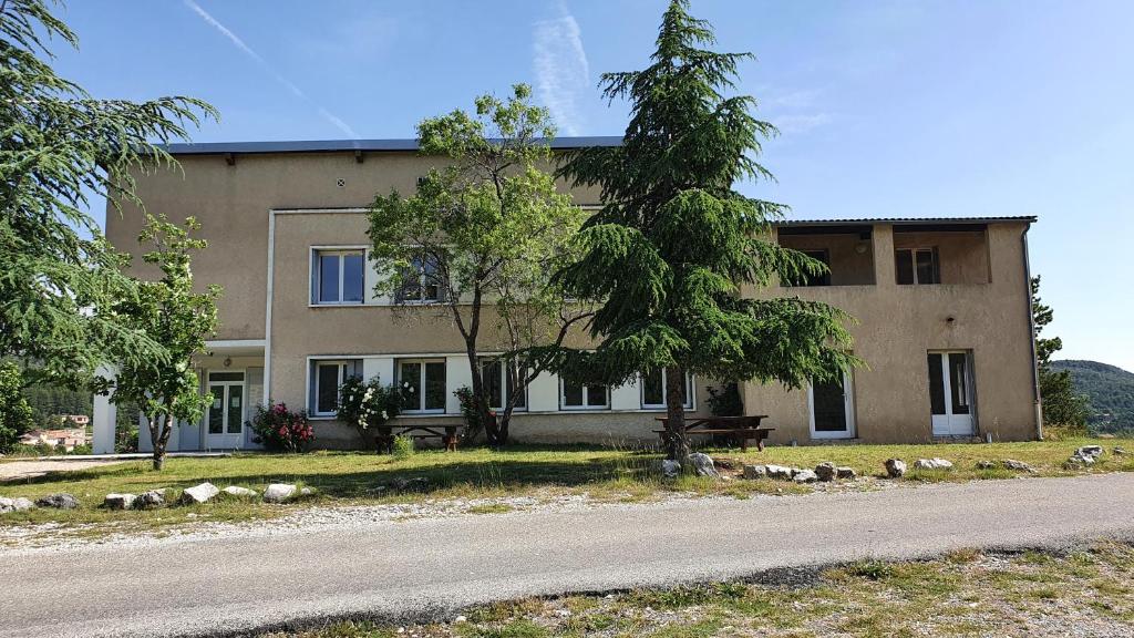 a building on the side of a road at Auberge Collective Cozy&Family in La Palud sur Verdon