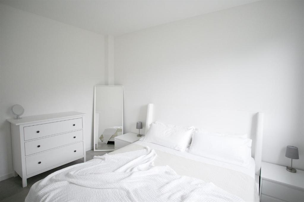 Postel nebo postele na pokoji v ubytování IseoLakeRental - Trivia Resort