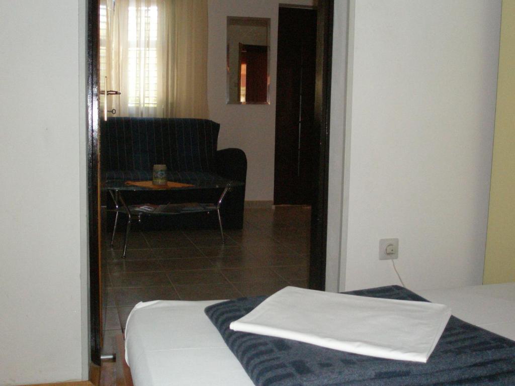 Łóżko lub łóżka w pokoju w obiekcie Apartment Borik