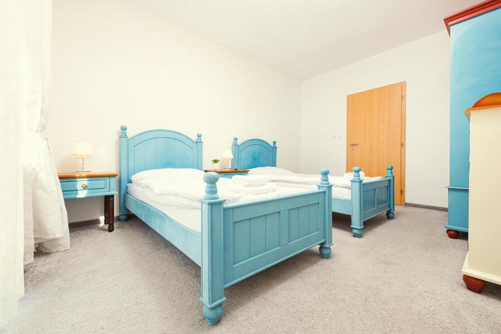 Postel nebo postele na pokoji v ubytování Hotel Ostende