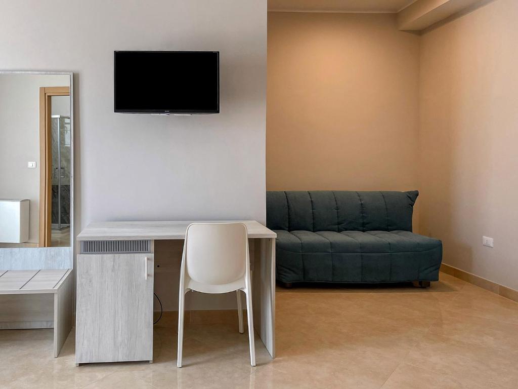 TV a/nebo společenská místnost v ubytování Karpignàna Hotel