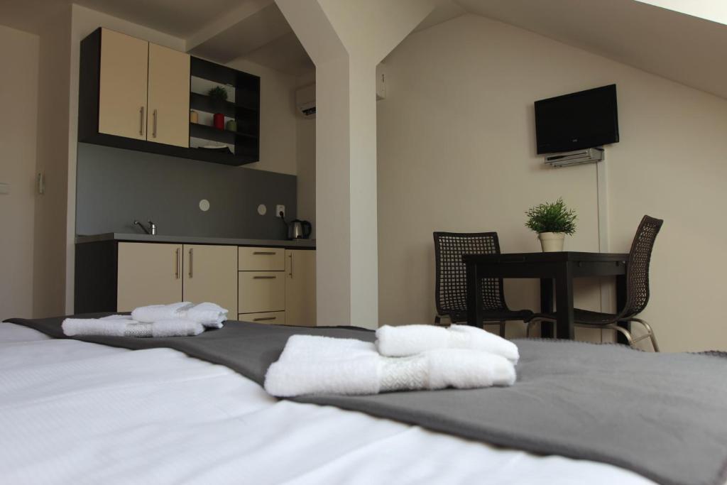 Postel nebo postele na pokoji v ubytování Residence Vysta