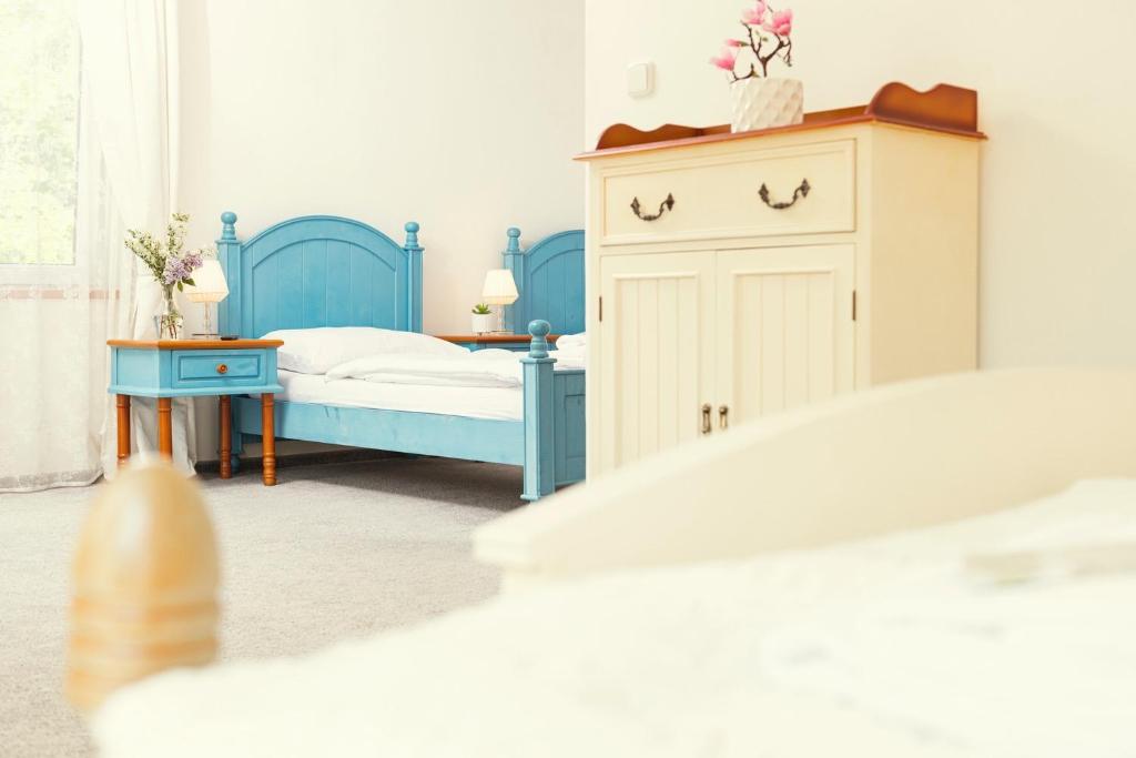 Postel nebo postele na pokoji v ubytování Hotel Ostende