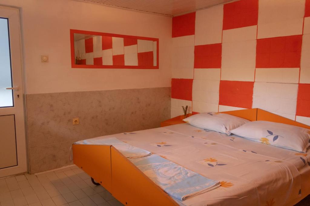Postel nebo postele na pokoji v ubytování Rooms Molabeciri