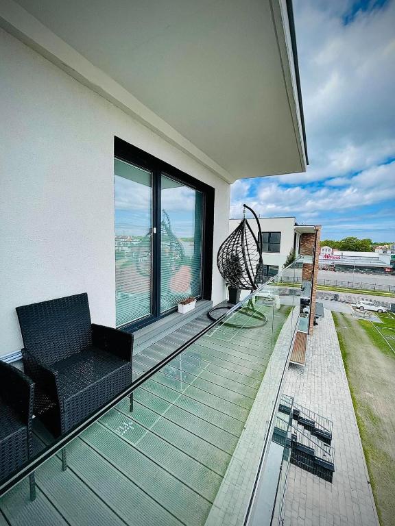 Balkón alebo terasa v ubytovaní Całoroczny Apartament Perłowa Przystań