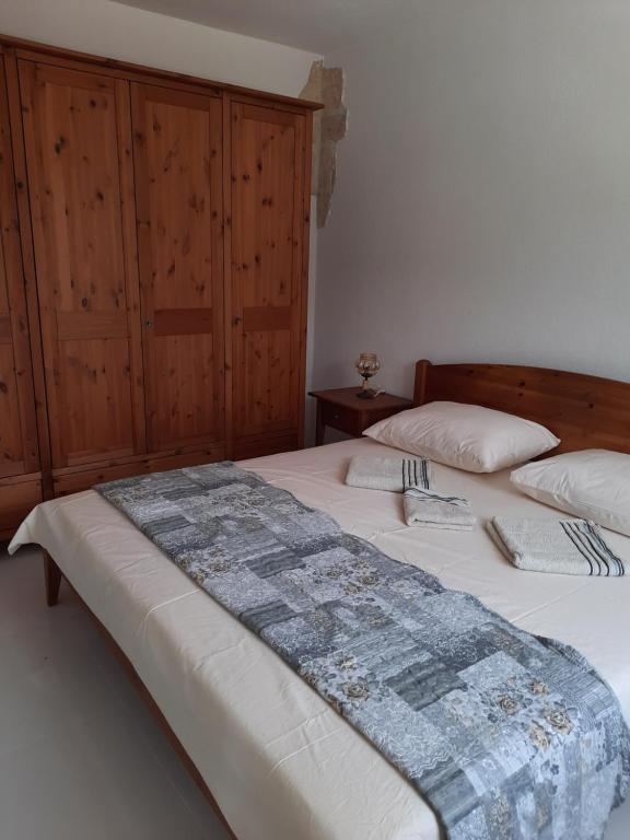 Postel nebo postele na pokoji v ubytování Stone house Zgogo