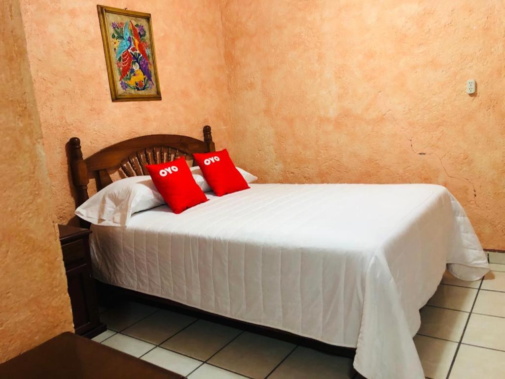 Postel nebo postele na pokoji v ubytování Hotel Fernando´s