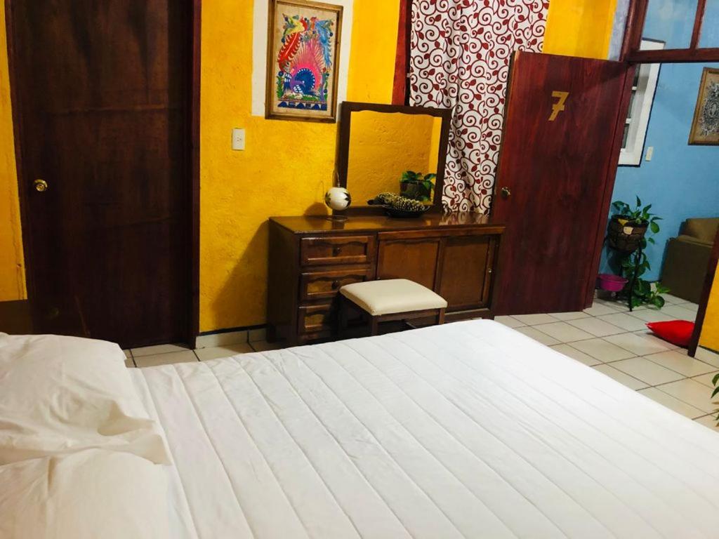 Postel nebo postele na pokoji v ubytování Hotel Fernando´s