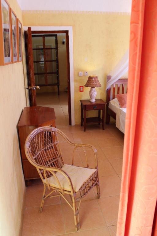 Postel nebo postele na pokoji v ubytování La Reine Creole