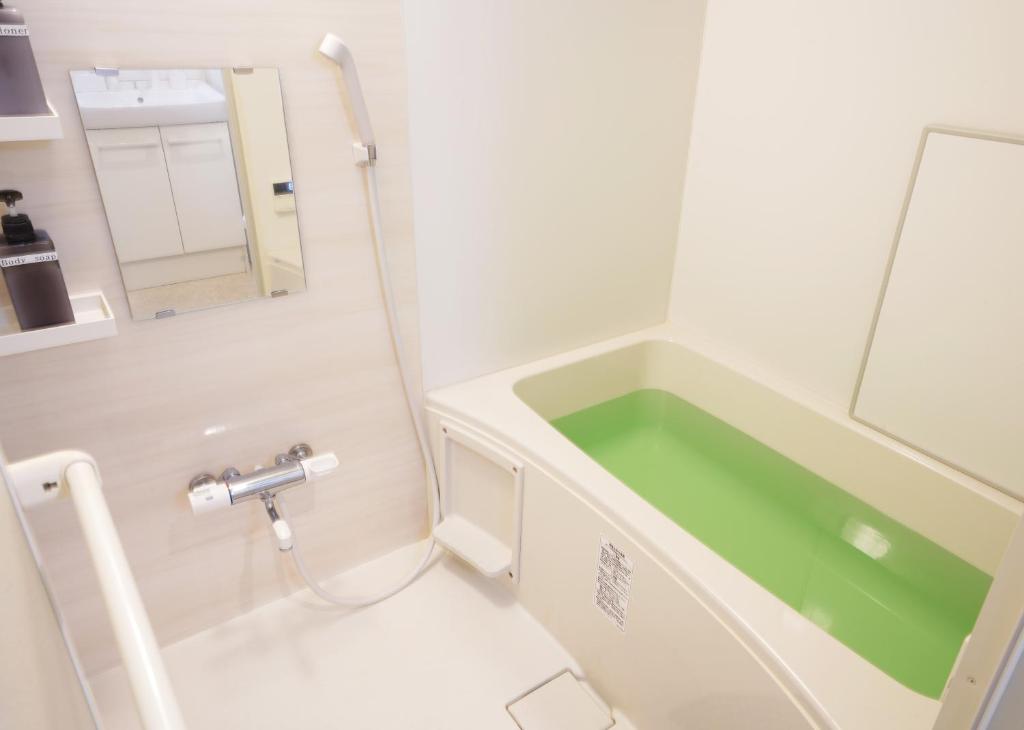 Koupelna v ubytování Laffitte Hirai Condominium Hotel