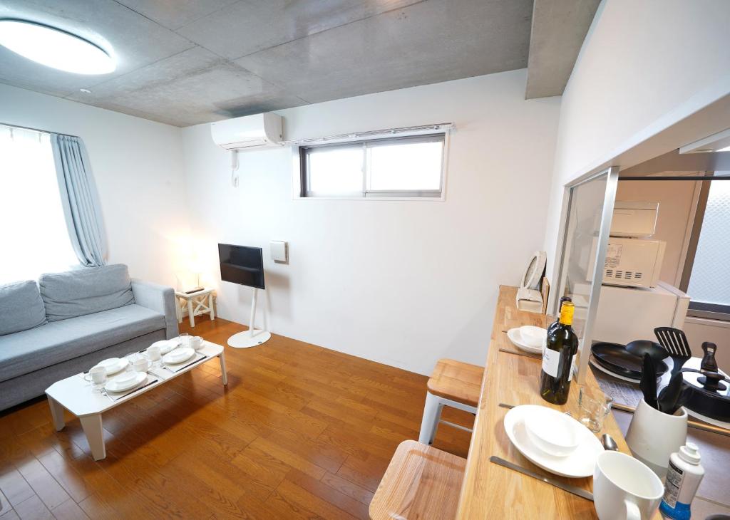 Kuchyň nebo kuchyňský kout v ubytování Laffitte Hirai Condominium Hotel
