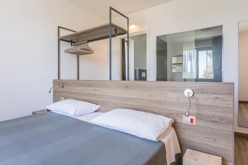 Postel nebo postele na pokoji v ubytování INSULA FELIX Bed&Breakfast