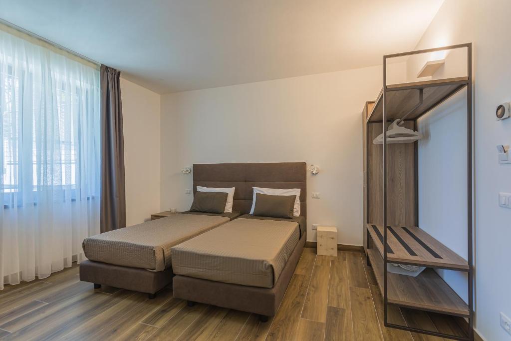 Postel nebo postele na pokoji v ubytování INSULA FELIX Bed&Breakfast