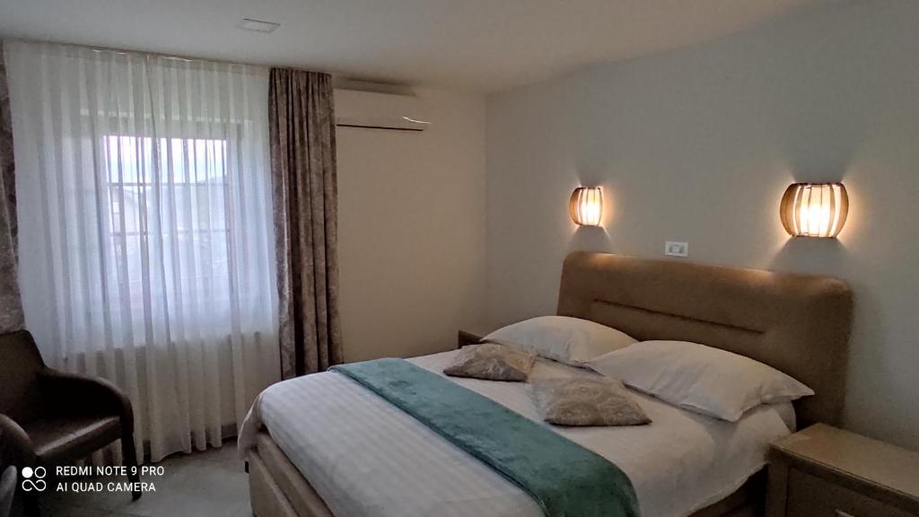 Postel nebo postele na pokoji v ubytování Plitvice Inn