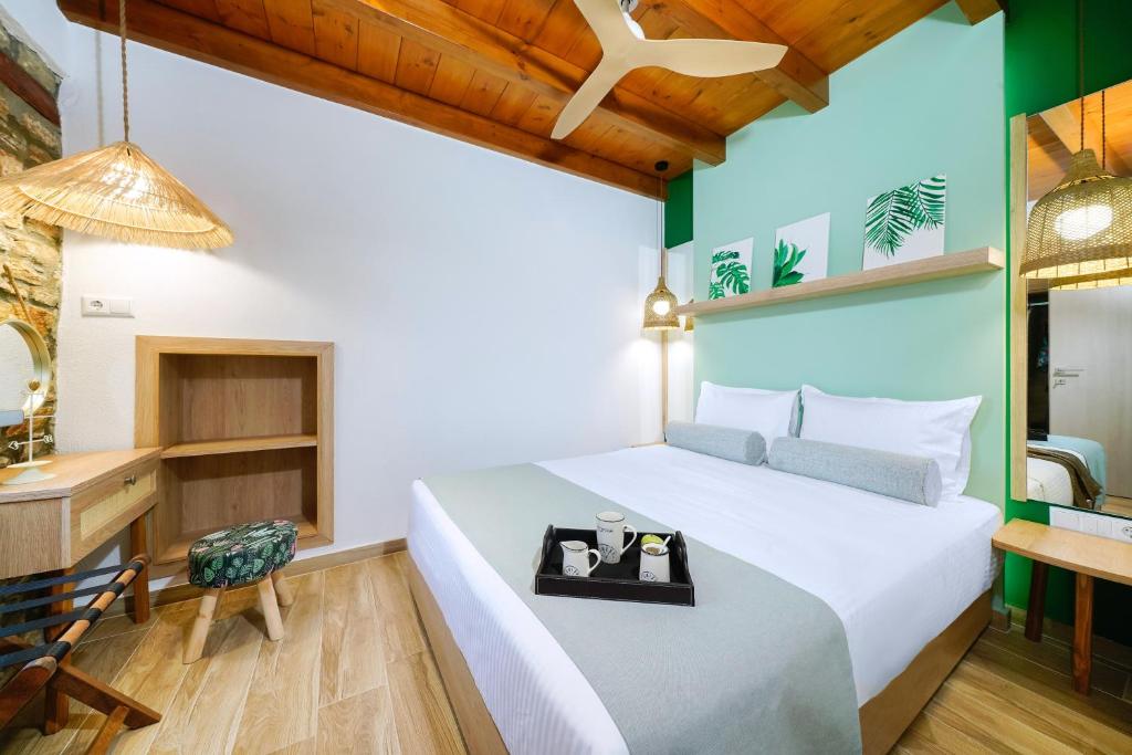 Postel nebo postele na pokoji v ubytování Villa Evilion